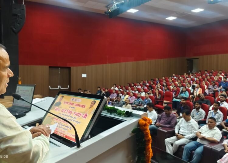 Dr. Dhan Singh Rawat